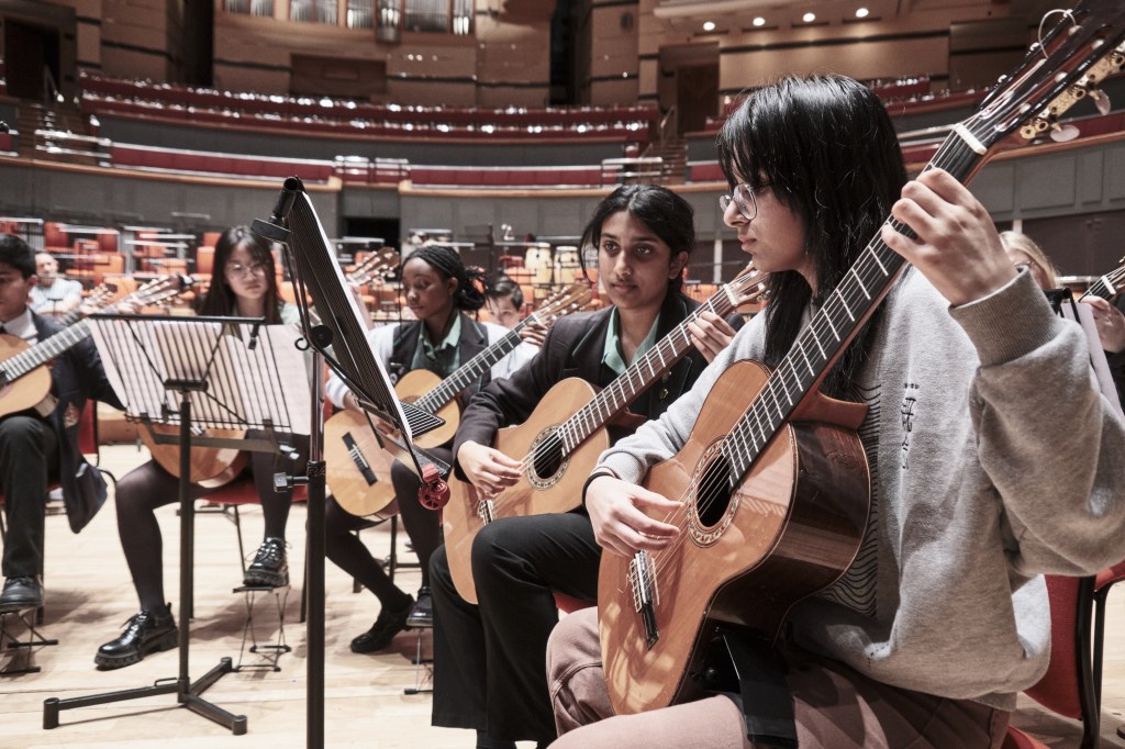 Symphony Hall, Birmingham. Musicians from King Edward’s School and King Edward’s High School for Girls, Birmingham, rehearse and perform.